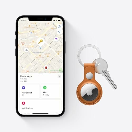 Smartphone displaying a map with AirTag and keys.